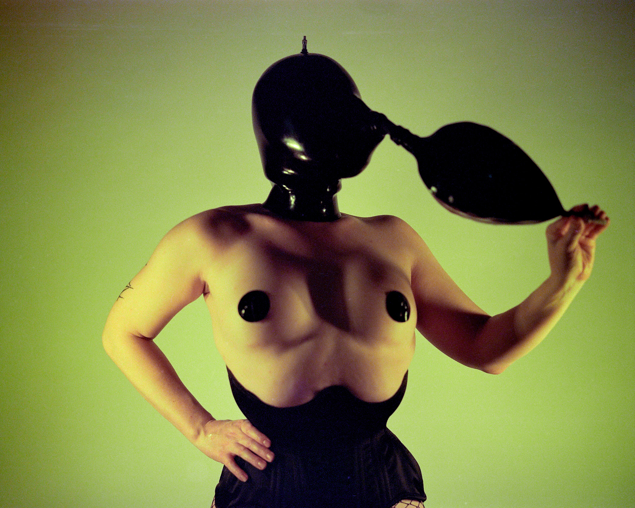 image of the artist, 3/4 portrait,
hooded
